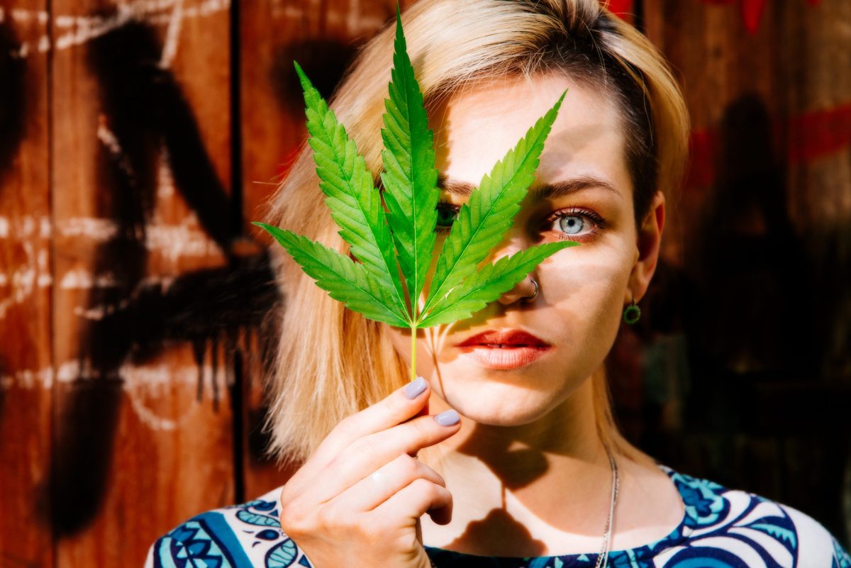 GIRL AND CANNABIS PLANT 164221597 1 scaled 1 | topicals